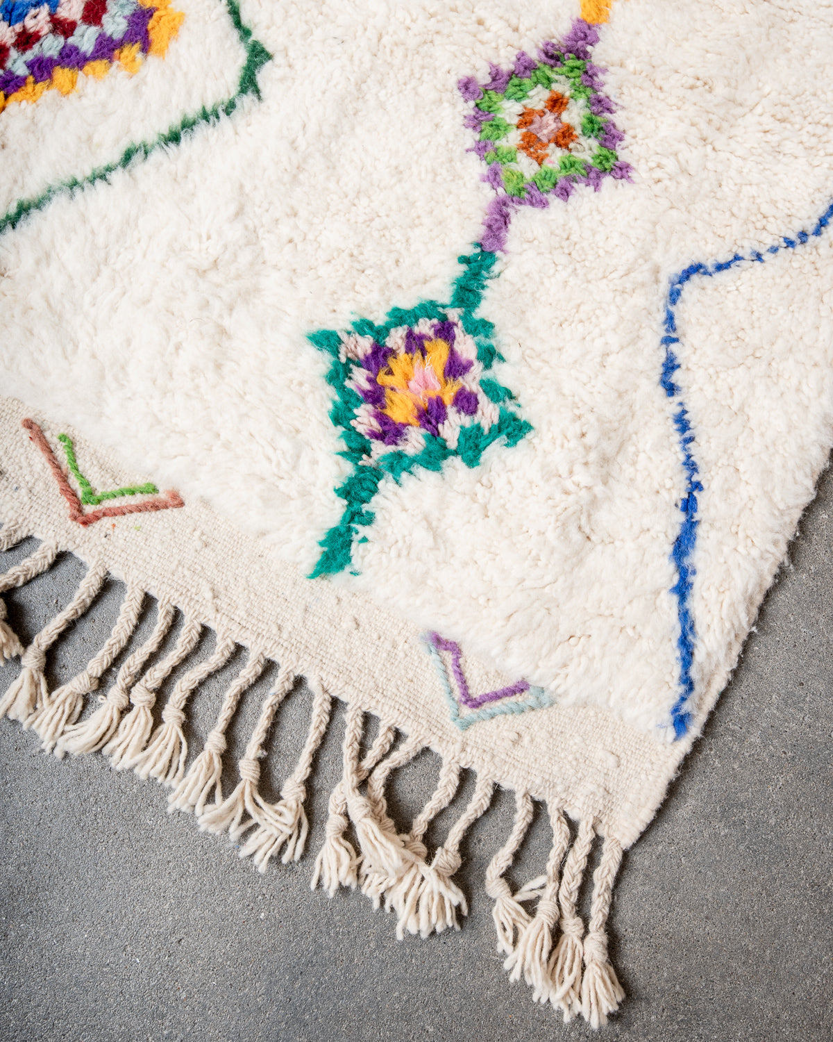 Modern, designer, handcrafted Berber rug from Morocco. Beniourain carpet with beautiful colours and patterns and fluffy wool texture.
